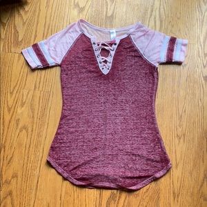 Pink and maroon shirt with crosses in the neckline